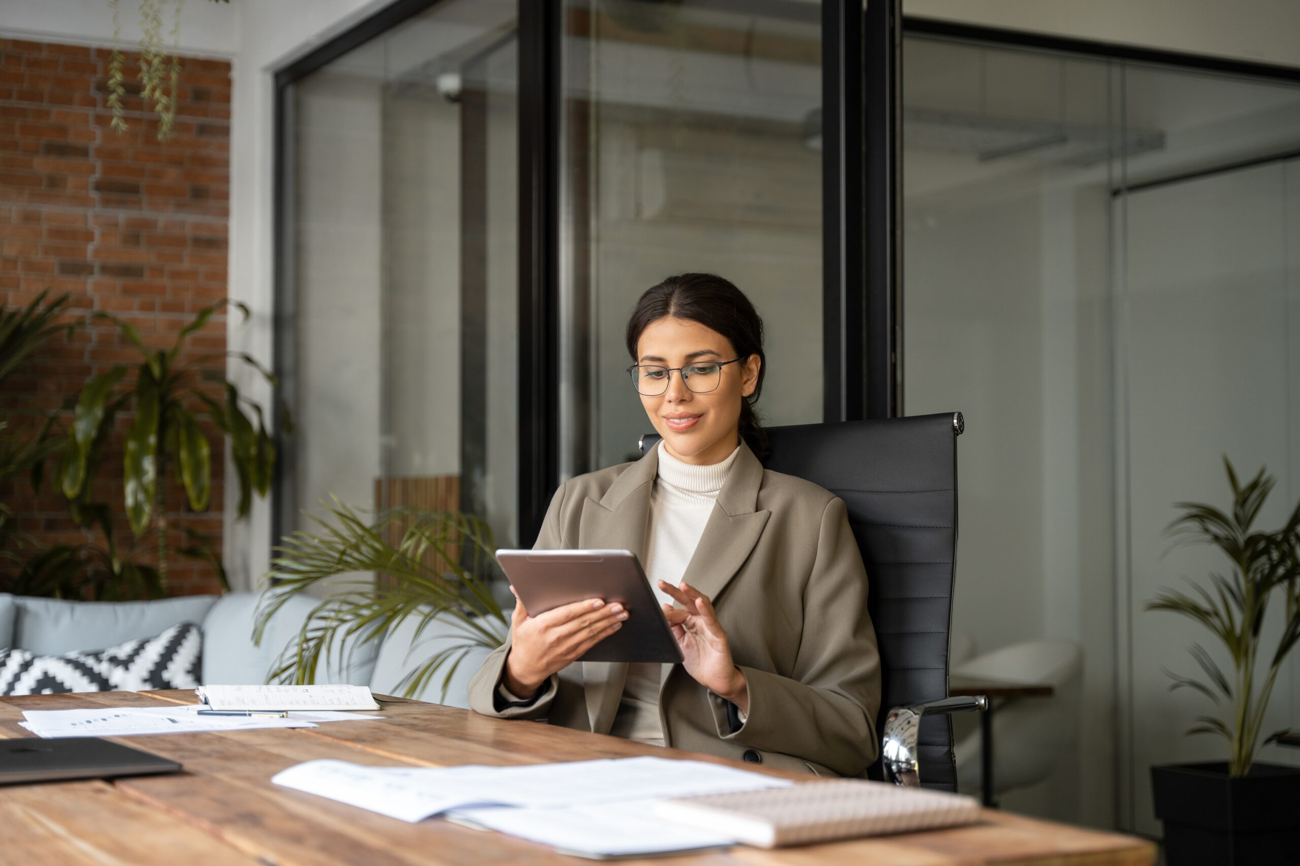 Financial services professional using tablet to review participant data